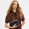 Bolso con marco Kisslock 16