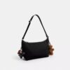 Bolso cruzado Leo en Nailon exclusivo con Charms