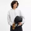 Bolso cruzado Leo en Nailon exclusivo con Charms