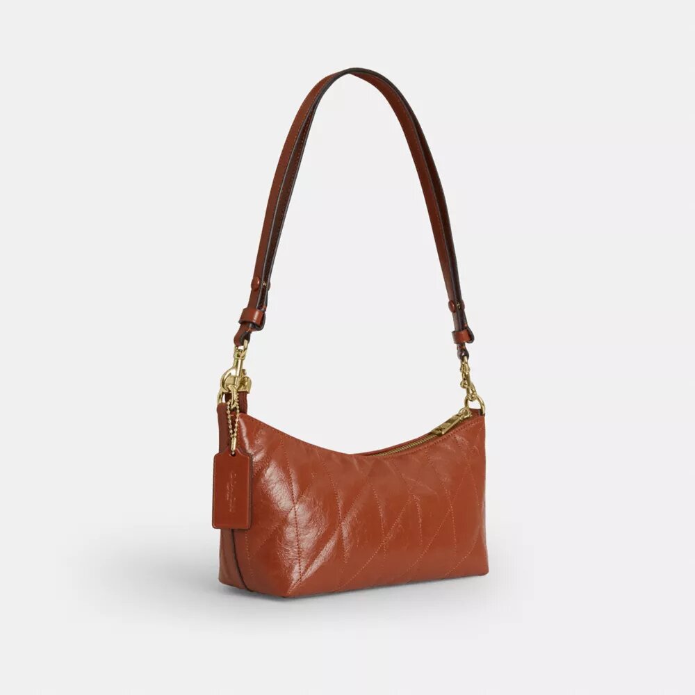 Bolso de hombro Caitlin con acolchado y dije