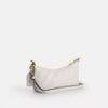 Bolso de hombro Caitlin con acolchado y dije