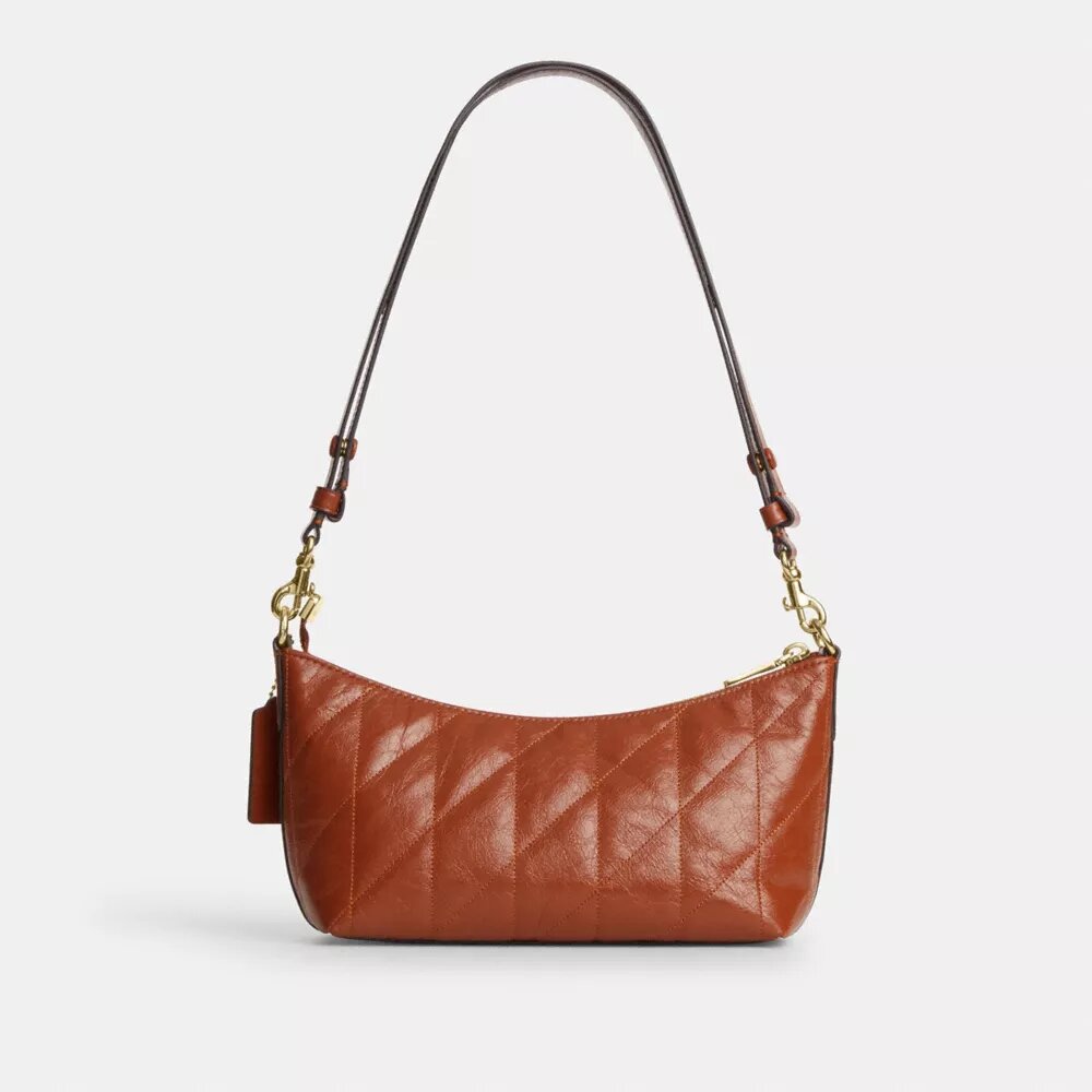 Bolso de hombro Caitlin con acolchado y dije