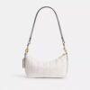Bolso de hombro Caitlin con acolchado y dije