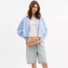 Bolso de hombro pequeño con solapa Etta y aplique floral