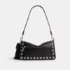 Bolso de hombro Tabby 26 con remaches estilo western