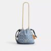 Bolso Faye Mini con cordón en denim exclusivo