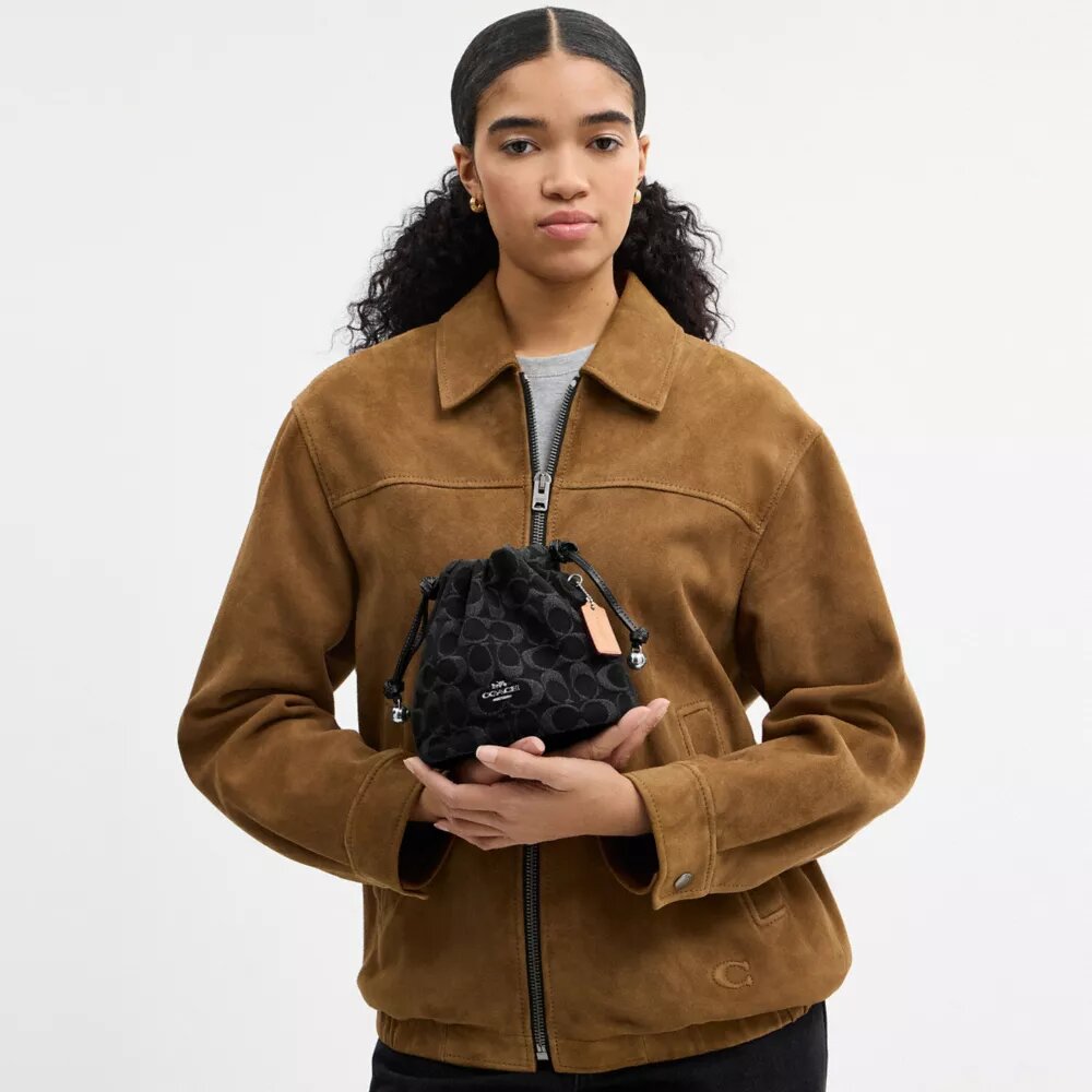Bolso Faye Mini con cordón en denim exclusivo