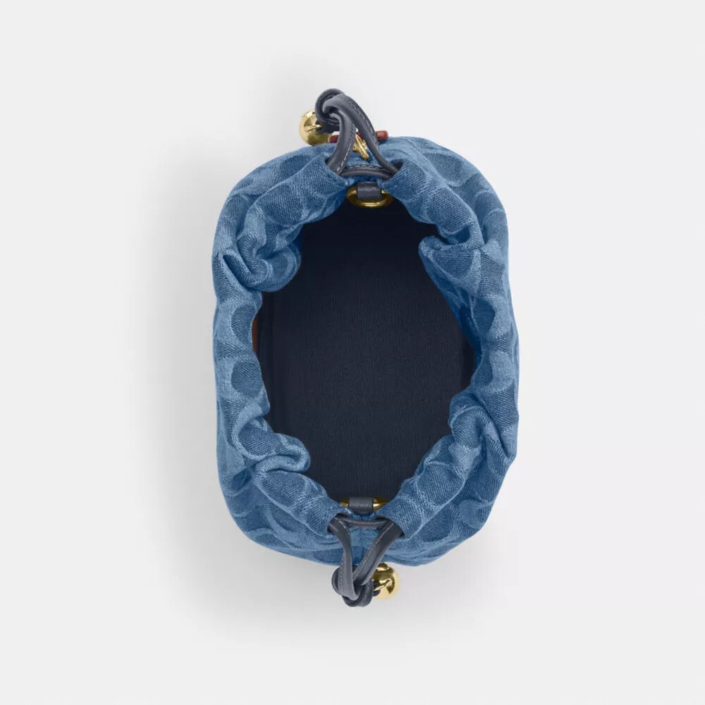 Bolso Faye Mini con cordón en denim exclusivo