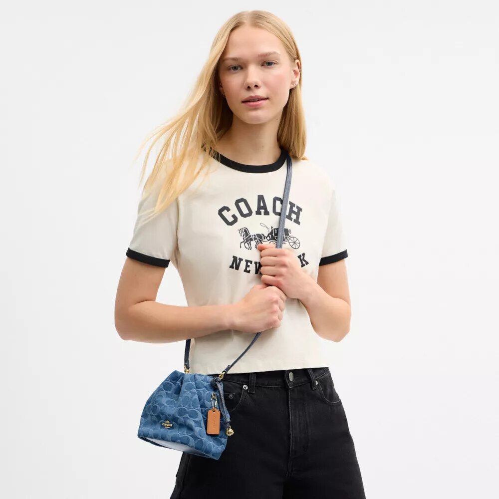 Bolso Faye Mini con cordón en denim exclusivo