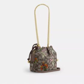 Bolso Faye Mini con cordón en jacquard exclusivo con bordado floral