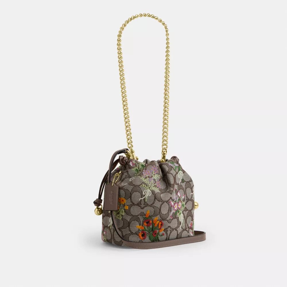 Bolso Faye Mini con cordón en jacquard exclusivo con bordado floral