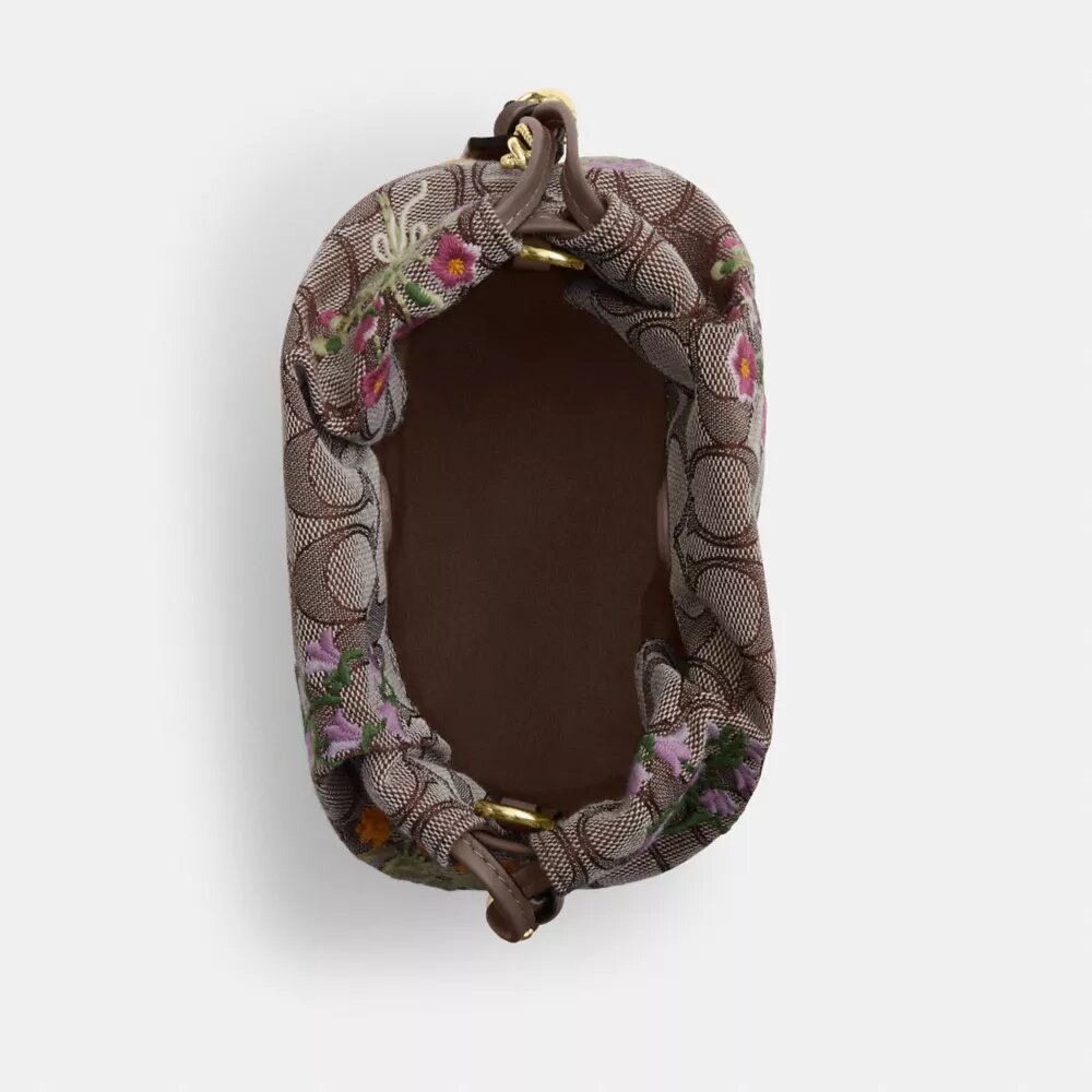Bolso Faye Mini con cordón en jacquard exclusivo con bordado floral