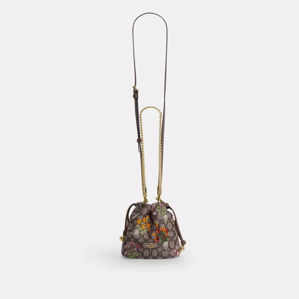 Bolso Faye Mini con cordón en jacquard exclusivo con bordado floral
