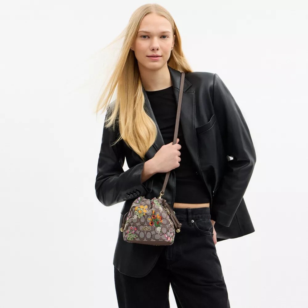 Bolso Faye Mini con cordón en jacquard exclusivo con bordado floral