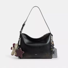 Bolso mensajero Mott de 38 en cuero desgastado con Charms