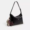 Bolso mensajero Mott de 38 en cuero desgastado con Charms