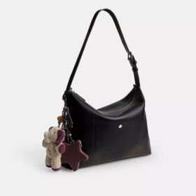 Bolso mensajero Mott de 38 en cuero desgastado con Charms