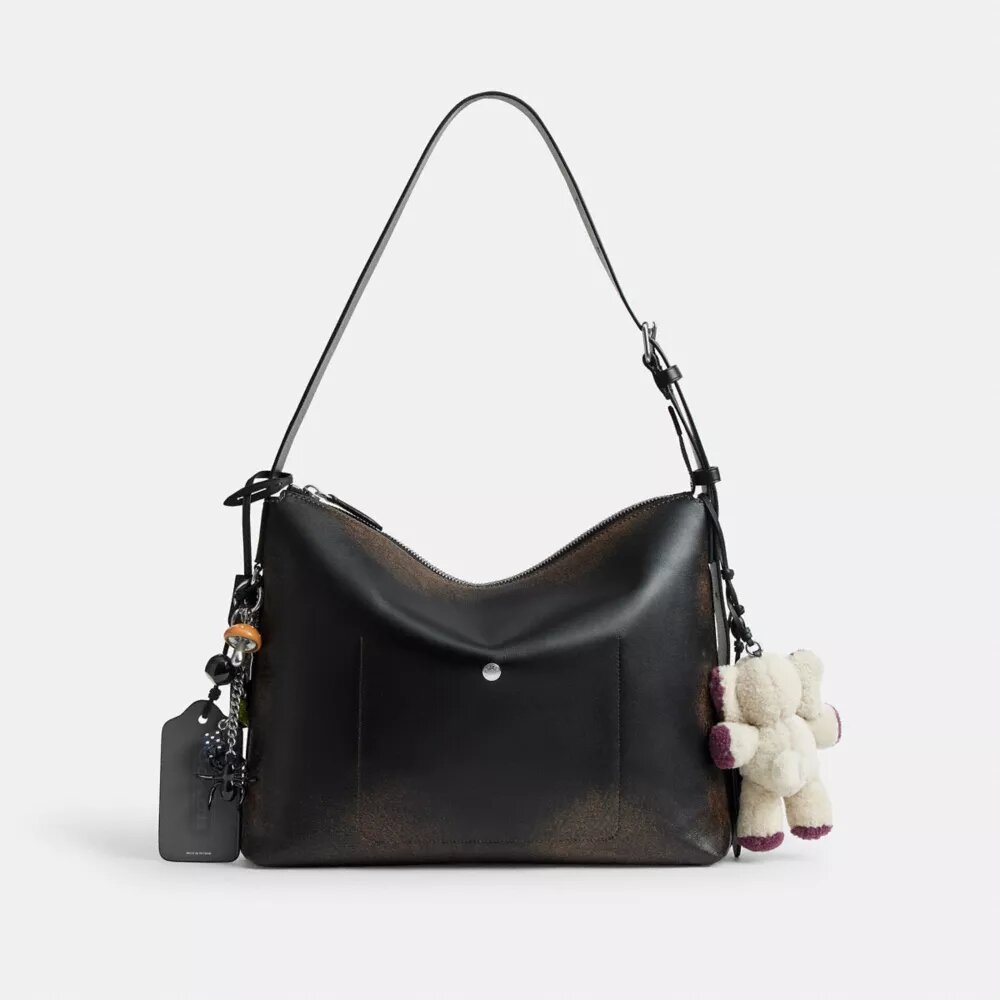 Bolso mensajero Mott de 38 en cuero desgastado con Charms