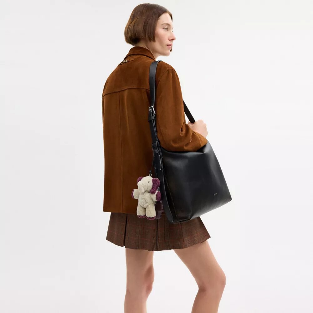 Bolso mensajero Mott de 38 en cuero desgastado con Charms