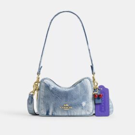 Bolso mini Carey de bandolera en denim desgastado con Charms