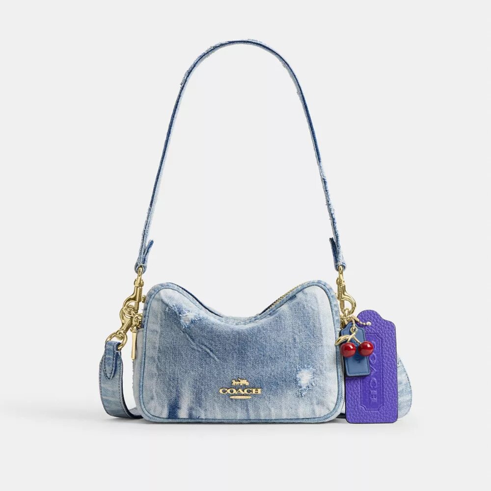 Bolso mini Carey de bandolera en denim desgastado con Charms