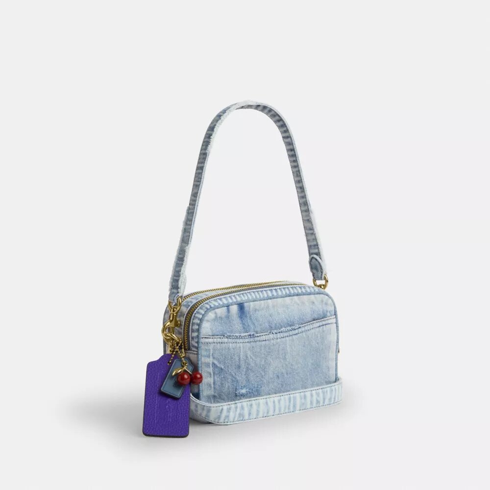 Bolso mini Carey de bandolera en denim desgastado con Charms