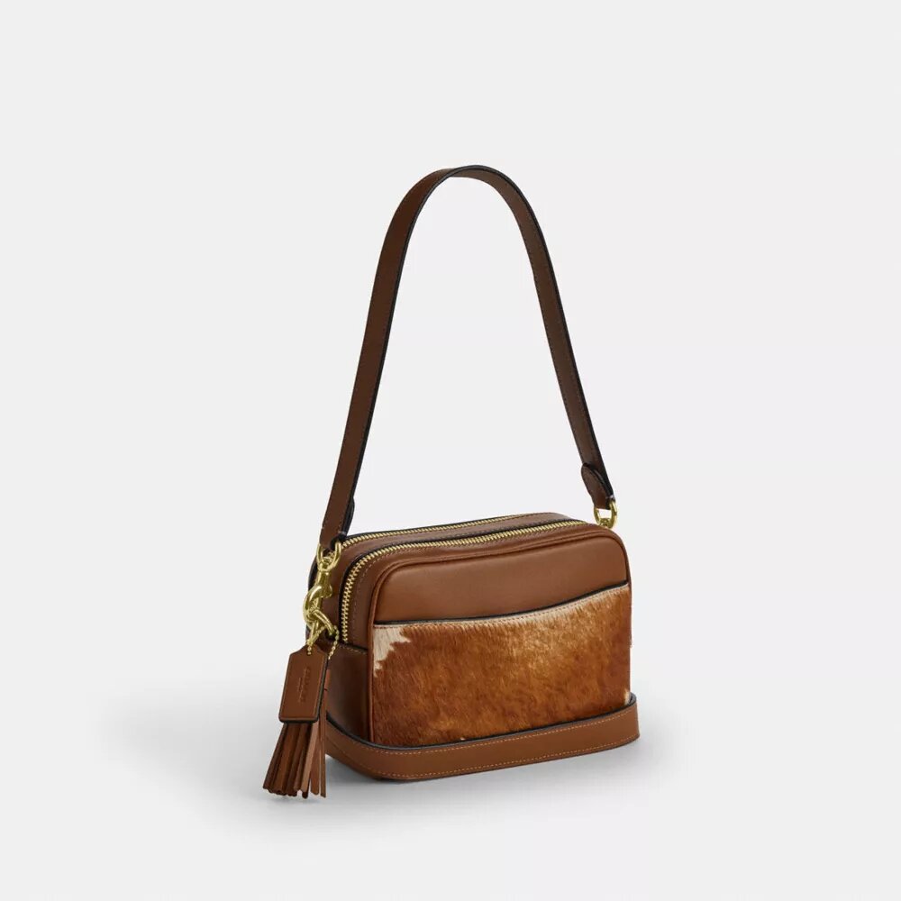 Bolso mini Carey de bandolera en piel de ternero con estampado de vaca