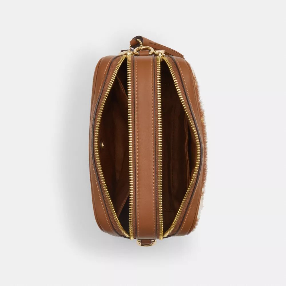 Bolso mini Carey de bandolera en piel de ternero con estampado de vaca