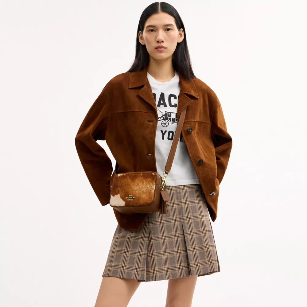 Bolso mini Carey de bandolera en piel de ternero con estampado de vaca
