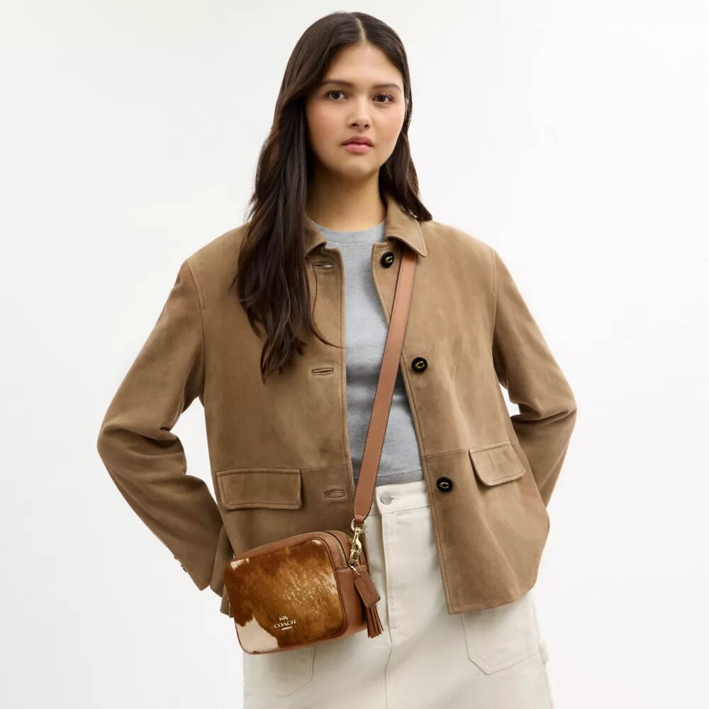 Bolso mini Carey de bandolera en piel de ternero con estampado de vaca