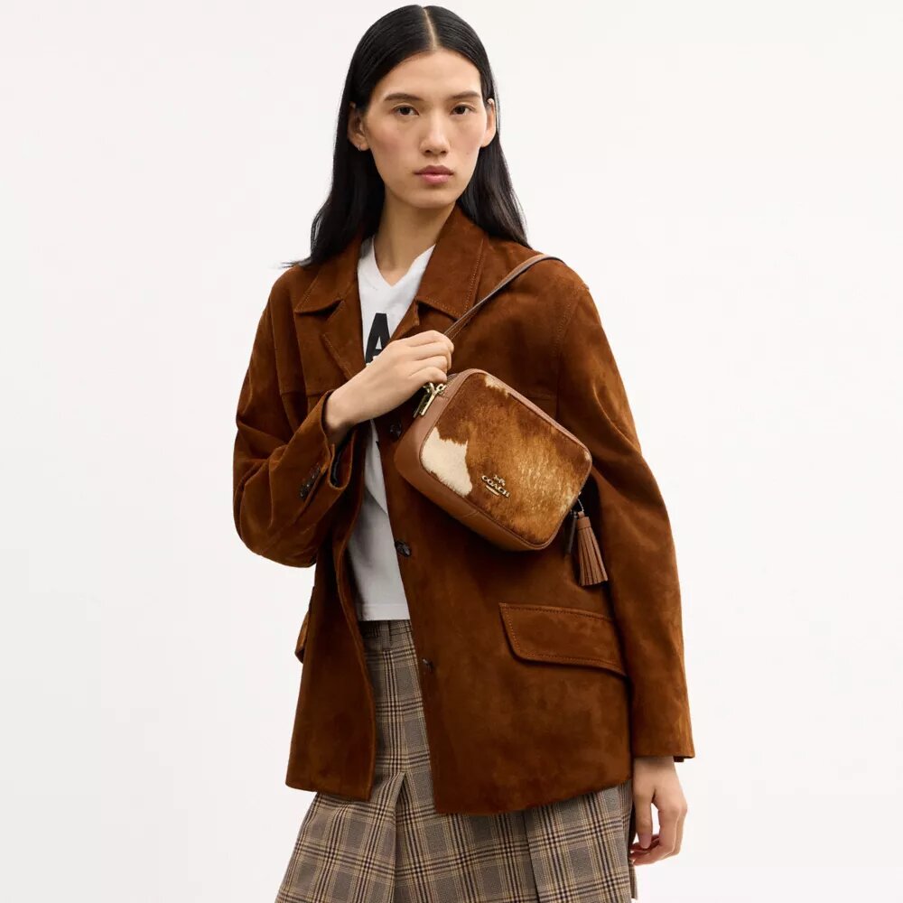 Bolso mini Carey de bandolera en piel de ternero con estampado de vaca