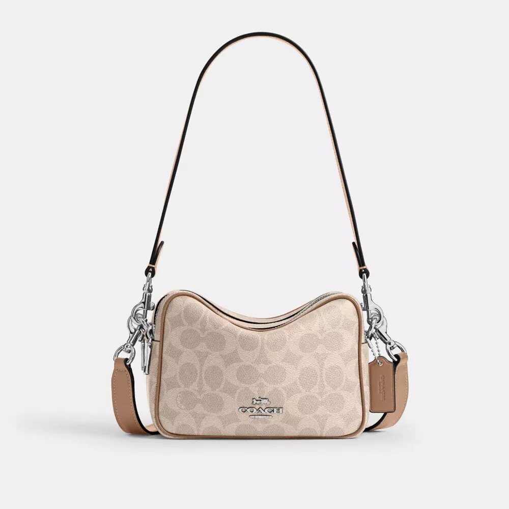 Bolso mini Carey de bandolera en Signature Canvas