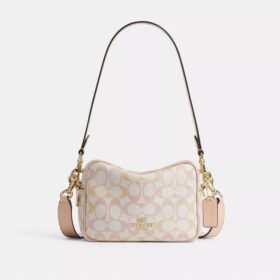 Bolso mini Carey de bandolera en Signature Canvas