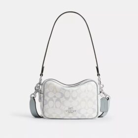 Bolso mini Carey de bandolera en Signature Canvas