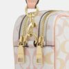 Bolso mini Carey de bandolera en Signature Canvas