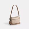 Bolso mini Carey de bandolera en Signature Canvas