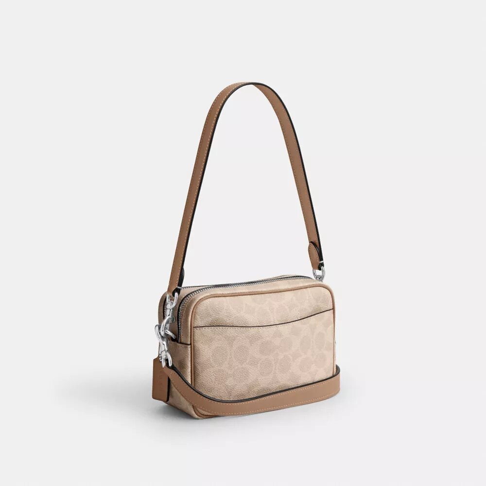 Bolso mini Carey de bandolera en Signature Canvas