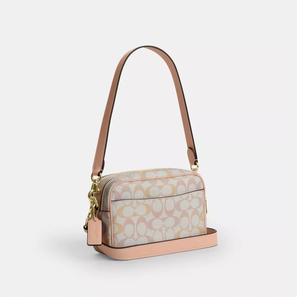 Bolso mini Carey de bandolera en Signature Canvas