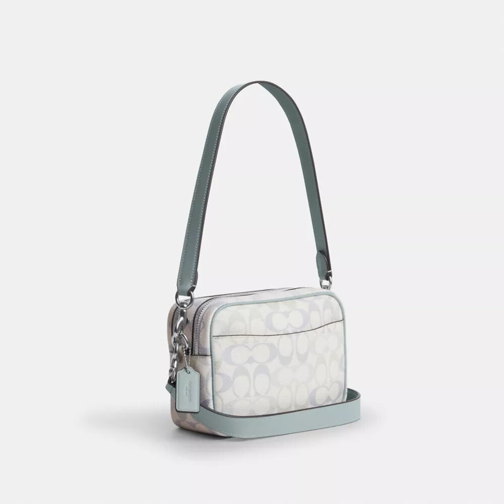 Bolso mini Carey de bandolera en Signature Canvas