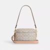 Bolso mini Carey de bandolera en Signature Canvas