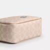 Bolso mini Carey de bandolera en Signature Canvas