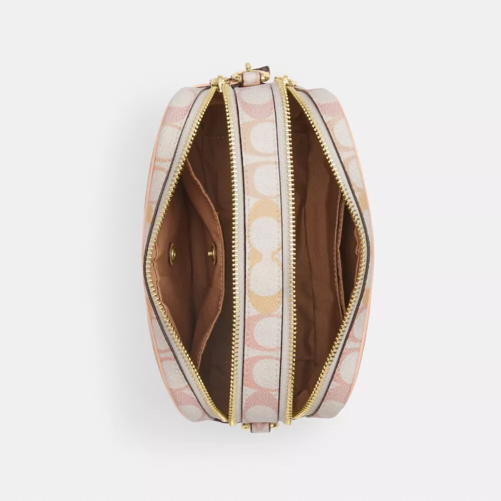 Bolso mini Carey de bandolera en Signature Canvas