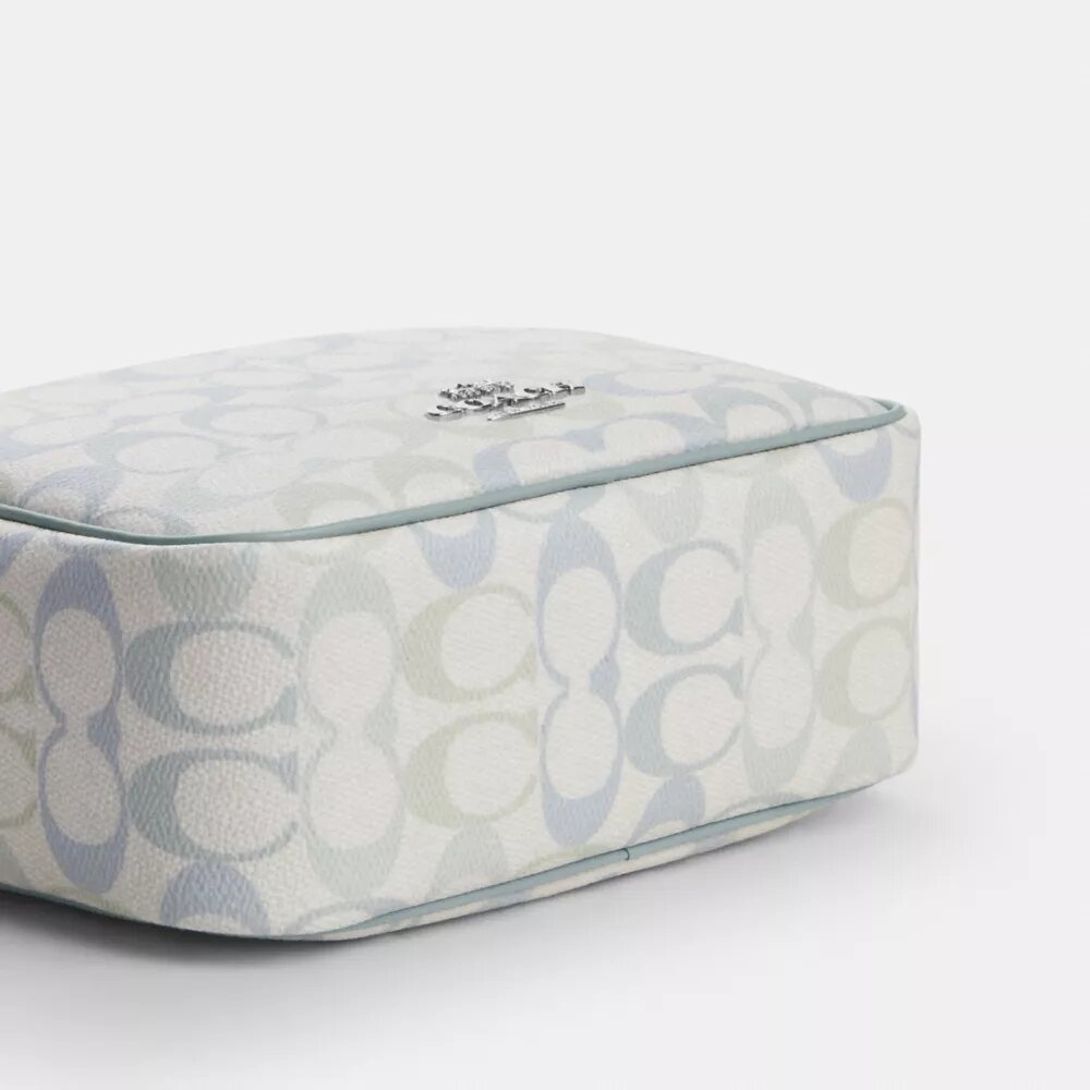 Bolso mini Carey de bandolera en Signature Canvas