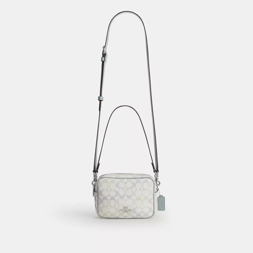 Bolso mini Carey de bandolera en Signature Canvas
