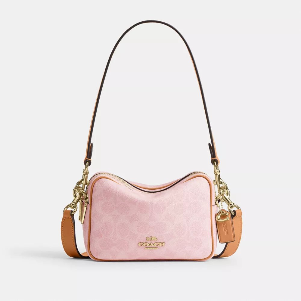 Bolso mini Carey de bandolera en Signature Canvas con Charms