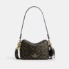 Bolso mini Carey para llevar en bandolera en Signature Canvas