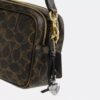Bolso mini Carey para llevar en bandolera en Signature Canvas