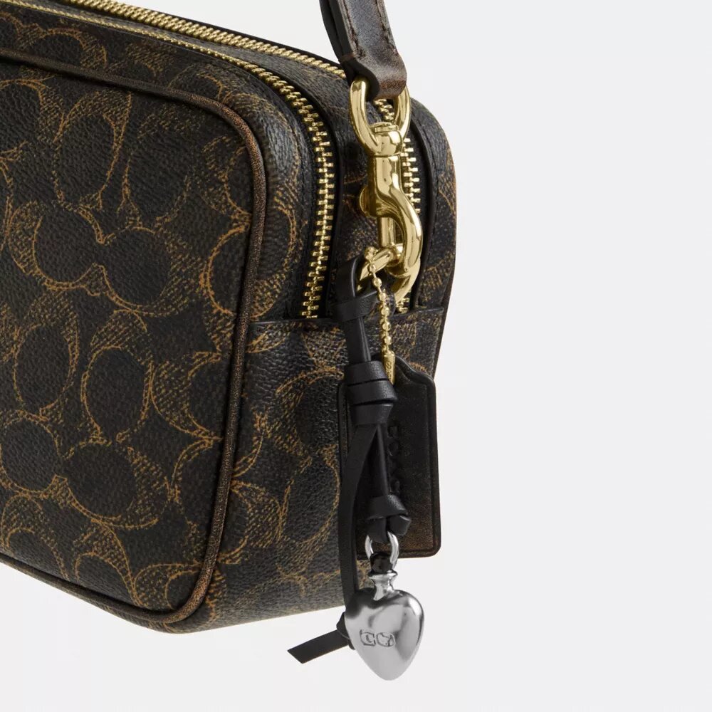 Bolso mini Carey para llevar en bandolera en Signature Canvas