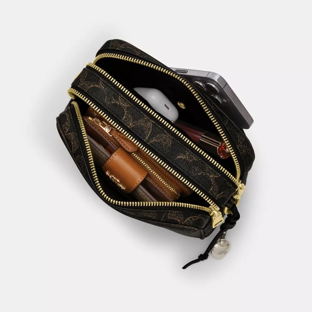 Bolso mini Carey para llevar en bandolera en Signature Canvas