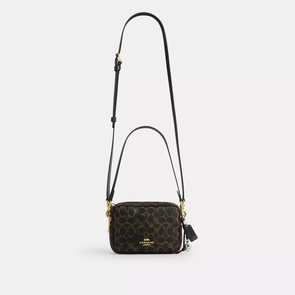 Bolso mini Carey para llevar en bandolera en Signature Canvas